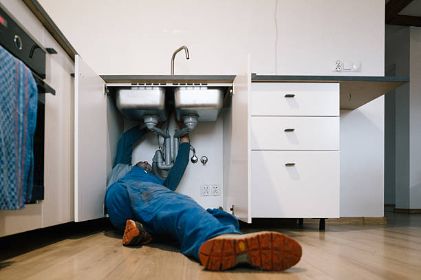 Professional Drain Cleaning technician working in Masonville, NY
